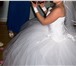 Фото в Одежда и обувь Свадебные платья Продам пышное белое свадебное платье с корсетом в Саратове 9 000